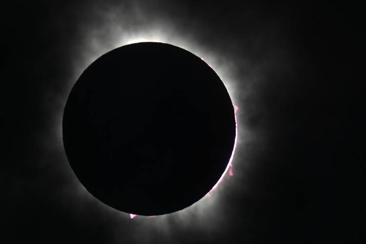 The moon covers the sun during a total solar eclipse, as seen from Fort Worth, Texas, Monday, April 8.