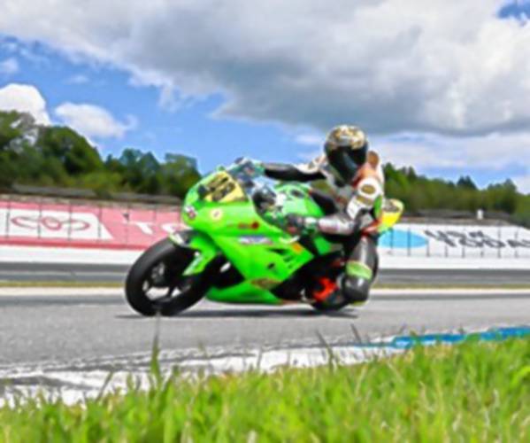14-year-old, Cole Thompson (848), raced his Kawasaki 300 Ninja in Daytona, Fla. for the 