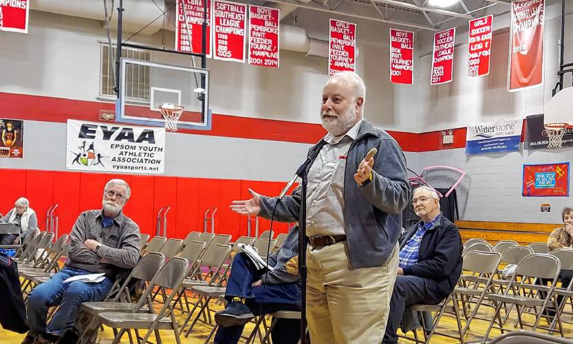 State Representative Dan McGuire addresses fellow Epsom residents at the town deliberative session held Saturday morning at the elementary school.