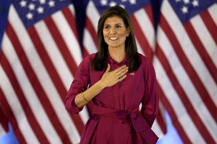 FILE - Republican presidential candidate former UN Ambassador Nikki Haley gestures to the audience as she concludes a speech at a caucus night party in West Des Moines, Iowa, Jan. 15, 2024. Haley has suspended her Republican presidential campaign. The former South Carolina governor ended her White House bid Wednesday, March 6. (AP Photo/Abbie Parr, File)