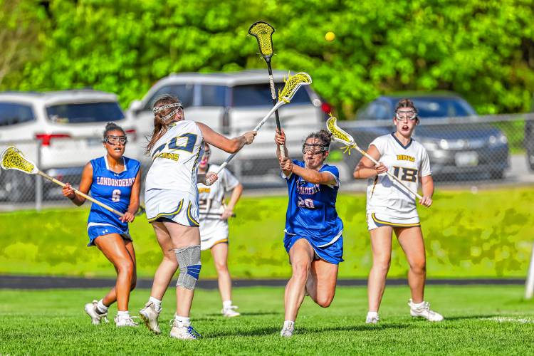 Bow's Kendall Murray (20) fires the game-winning goal on net against Londonderry in overtime on Thursday, May 23, 2024.