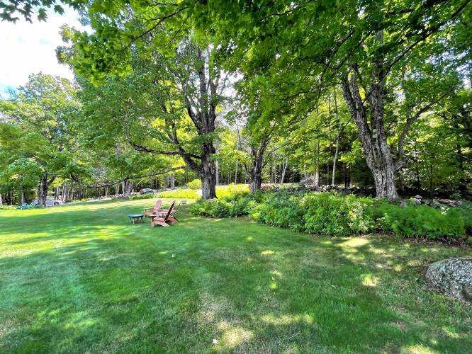 Old maples and stone walls on the south side.