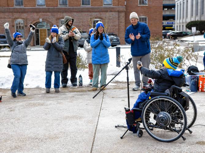 Broken Ground student Bodhi Bhattarai gets a round of applause after he adressed the crowd at the State House gathered on Tuesday to advocate against state cuts to special education funding.