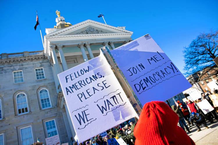 Hundreds of people rallied in front of the State House on Wednesday, February 5, 2025 as part of the national movement to protest the Project 2025.