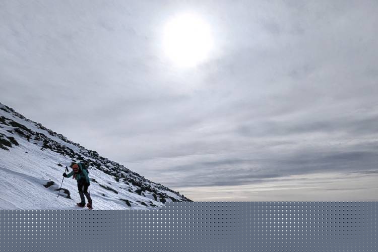 In this photograph provided by Kathyrn McKee, fellow hiker Beata LeLacheur treks along the Westside trail, hours before needing to be rescued, on Mount Washington, N. H., Sunday, Feb. 2, 2025. (Kathyrn McKee photo via AP)