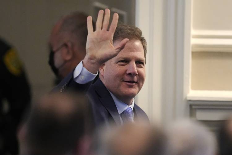 New Hampshire Governor Chris Sununu waves while being introduced prior to his State of the State address at the State House, Thursday, Feb. 15, 2024, in Concord, N.H. (AP Photo/Charles Krupa) New Hampshire Governor Chris Sununu waves while being introduced prior to his State of the State address at the State House, Thursday, Feb. 15, 2024, in Concord, N.H. (AP Photo/Charles Krupa)