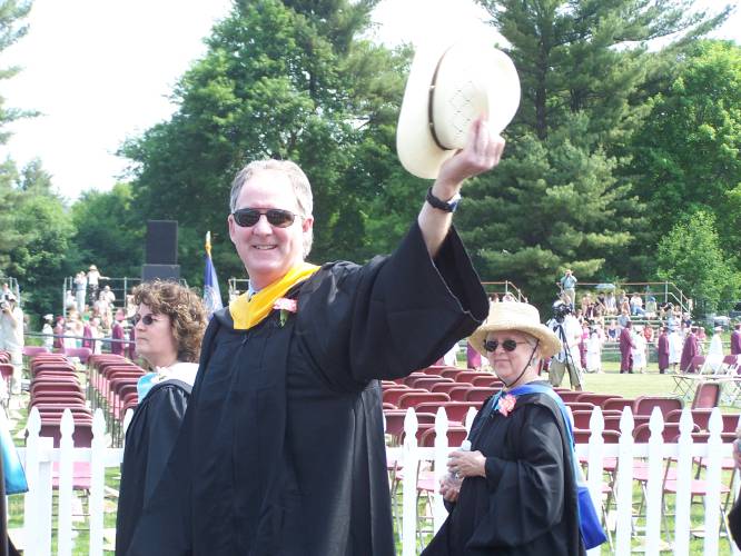 Rusty Cofrin waves to family and friends at the 2008 Concord High School graduation as he retires from teaching and coaching.