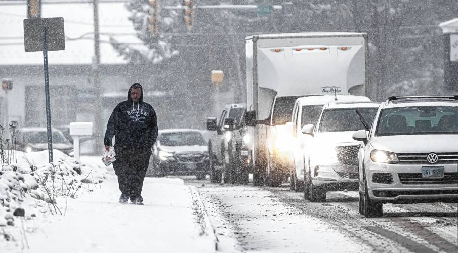 Al True walks along Route 3 in Tilton on the way back from the store on Tuesday, January 16, 2024.