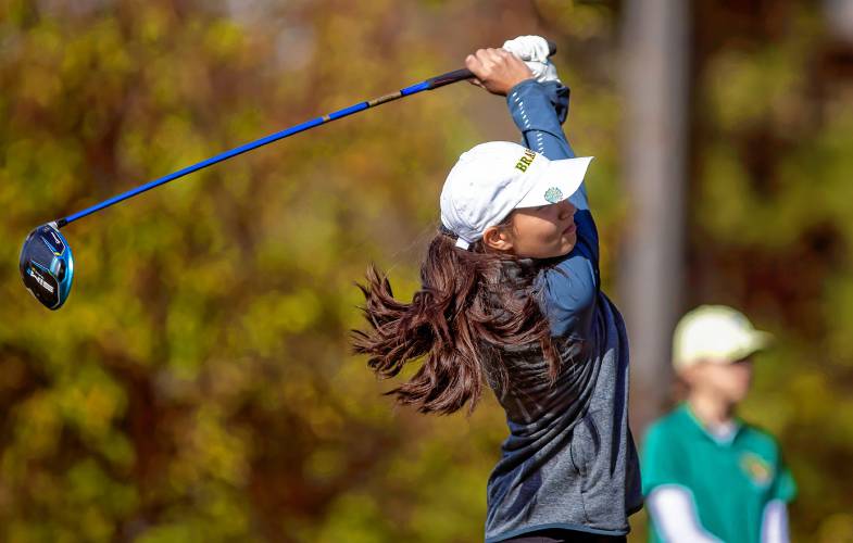 Bishop Brady golfer Mady Savary hits her tee shot on the first hole at the NHIAA Girls’ Individual State Championship at Beaver Meadow Golf Course on Oct. 14, 2023. Savary finished fourth in the girls’ state championship and was named to the Division III First Team as a freshman.