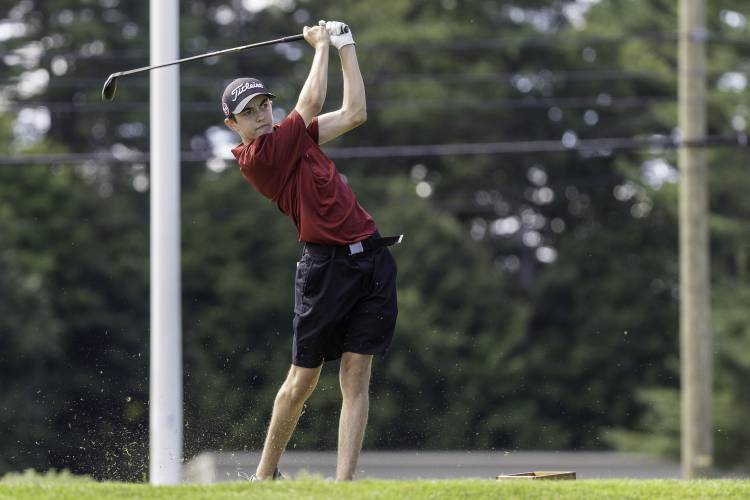 Concord’s Zach Nelson watches his drive off the first tee at Derryfield Country Club on Aug. 28.