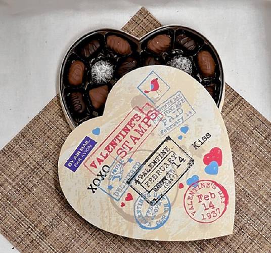 Granite State Candy Shoppe innovates their packaging for Valentine's Day each year. One of the 2025 boxes is called the 
“Sending Love Heart” and features a postage-inspired design.