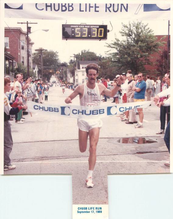 Rusty crosses the finish line, winning the Chubb Life 10-mile road race in September 1989.