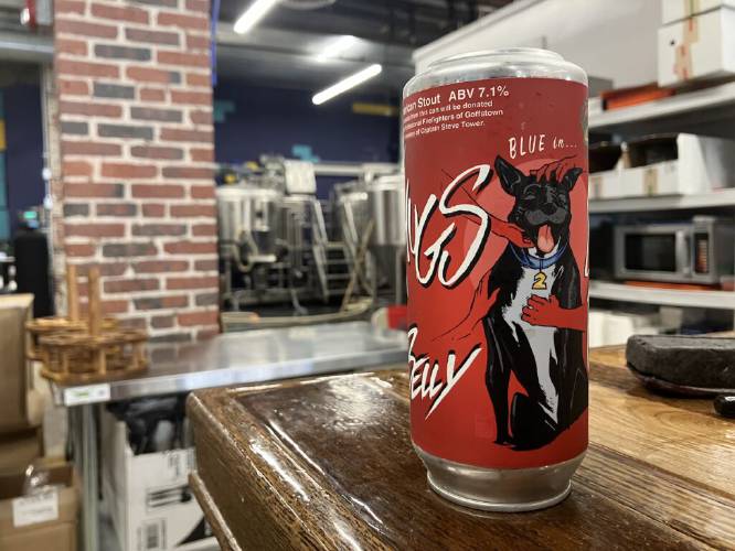 A can featuring a label for Hugs and Belly Rubs, a label at To Share Brewing in Manchester that was briefly blocked by the Liquor Commission for being too enticing for kids. 