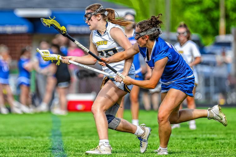 Bow's Kendall Murray (20) weaves through the defense during the Falcons' 11-10 overtime win over Londonderry. Murray scored the game-winning goal with 14 seconds left in the first OT. May 23, 2024.