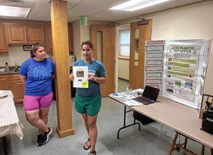 Green Mountain Conservation Group Education Coordinator Tara Schroeder, right, and Quality Coordinator Jill Emerson, left, discuss GMCG's Green Mountain Conservation Group Education Coordinator Tara Schroeder, right, and Quality Coordinator Jill Emerson, left, discuss GMCG's