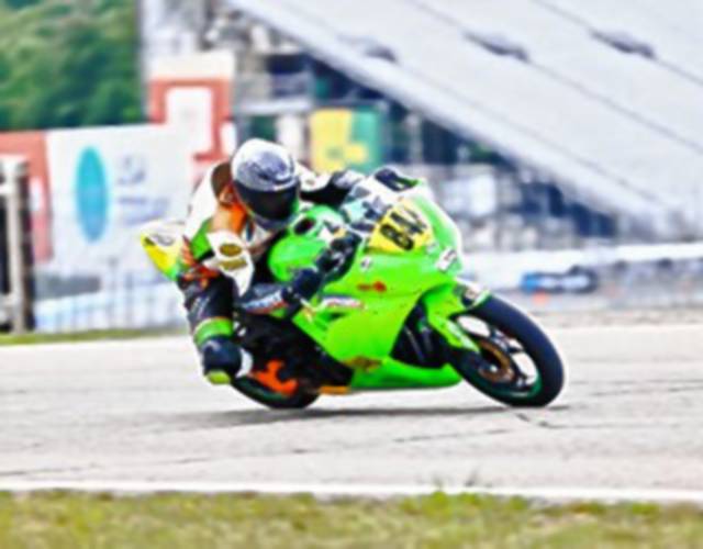 14-year-old, Cole Thompson (848), raced his Kawasaki 300 Ninja in Daytona, Fla. for the 