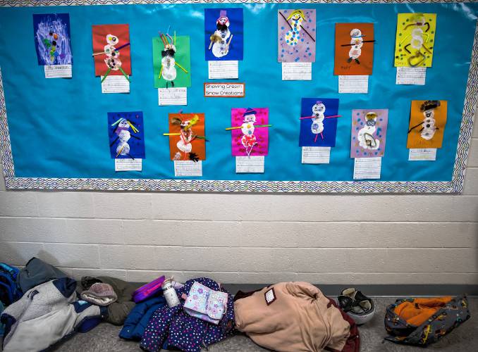 Student backpacks and coats line the hallway of Epsom Central School on Friday, January 24, 2025. Last week, a deadline for the school budget capproposals to be filed in certain districts,  and Epsom and Weare joined the list. 