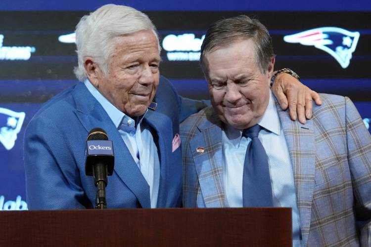 New England Patriots team owner Robert Kraft, left, and former Patriots head coach Bill Belichick embrace during an NFL football news conference, Thursday, Jan. 11, 2024, in Foxborough, Mass., to announce that Belichick, a six-time NFL champion, has agreed to part ways with the team. (AP Photo/Steven Senne)