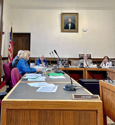 Members of the Senate Finance Committee listen to hearing testimony on HB1583, which would increase state funding for public education in the state.