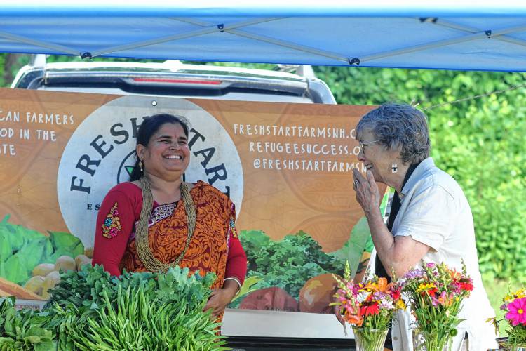 Becky Field and Harimaya Adikari at the Canterbury Farmers' Market.
