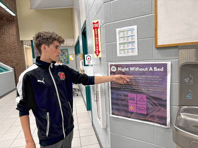 Finan Murphy, a junior at Hopkinton High School, is helping Family Promise organize their Night Without a Bed campaign. Throughout the school, he's hung posters to promote the campaign. Finan Murphy, a junior at Hopkinton High School, is helping Family Promise organize their Night Without a Bed campaign. Throughout the school, he's hung posters to promote the campaign.