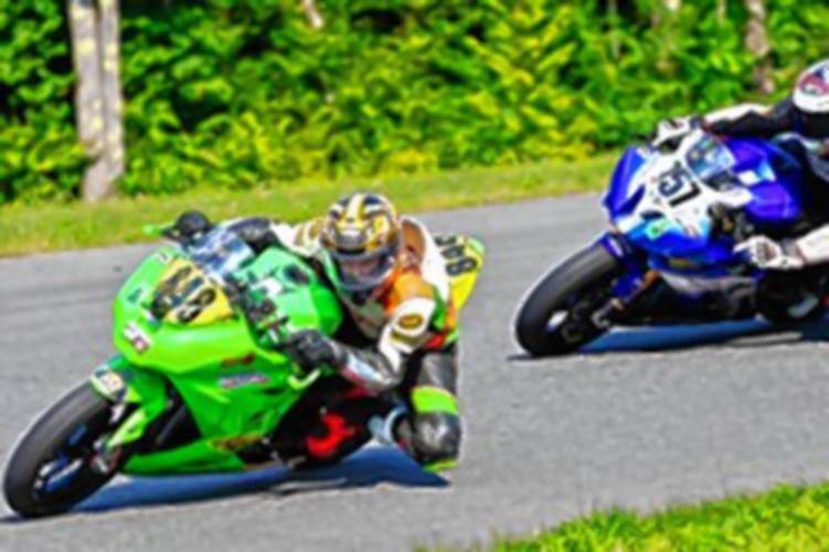 Kyle Thompson (757) and his son, Cole, (848) on the track in Loudon. Both competed in Daytona's 