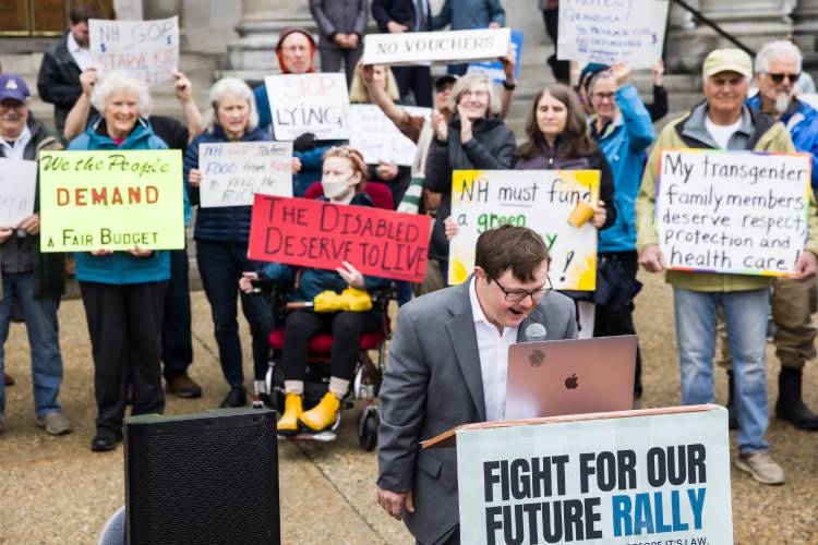 Forrest Beaudoin-Friede speaks at the Fight for Our Future rally at the State House before the budget hearing inside the Representatives Hall on Tuesday, May 6, 2025. Beaudoin-Friede sent his speech into the record to the budget hearing.