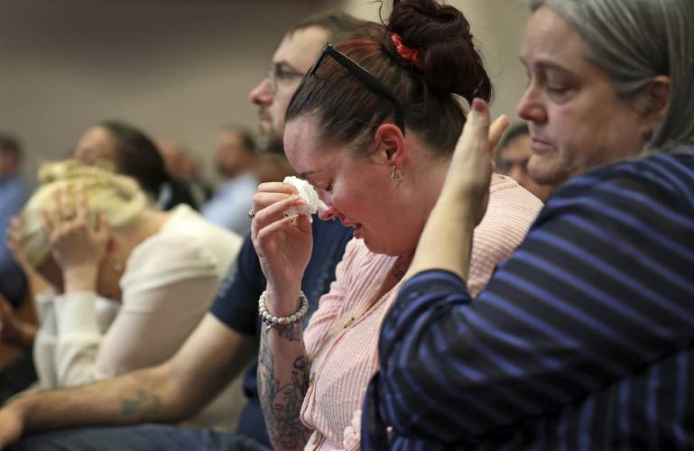 Crystal Sorey, Harmony Montgomery's biological mother, cries as she listens to the prosecution's closing argument in Adam Montgomery's trial, Wednesday, Feb. 21, 2024, in Manchester, N.H. Montgomery is accused of killing his 5-year-old daughter Harmony. At right is Michelle Raftery, Harmony Montgomerys foster parent. (Jim Davis/The Boston Globe via AP, Pool)