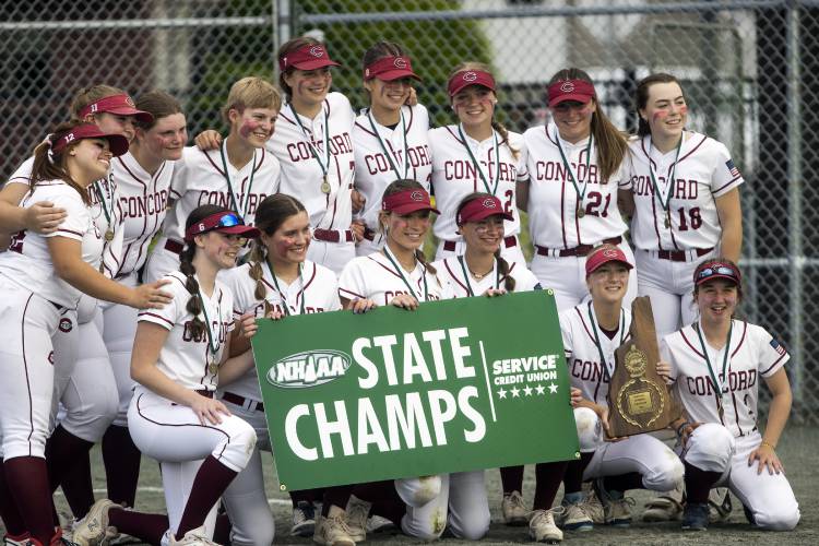 The Concord High School state champions pose for photographs after winning the Division I softball title last June at Plymouth State.
