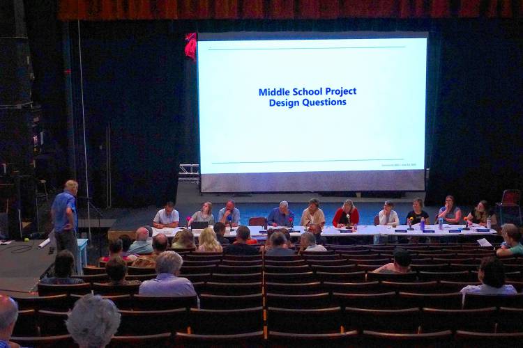 Concerned Citizens member Charlie Russell spars with the school board at a Q&A on June 18 at CHS. 